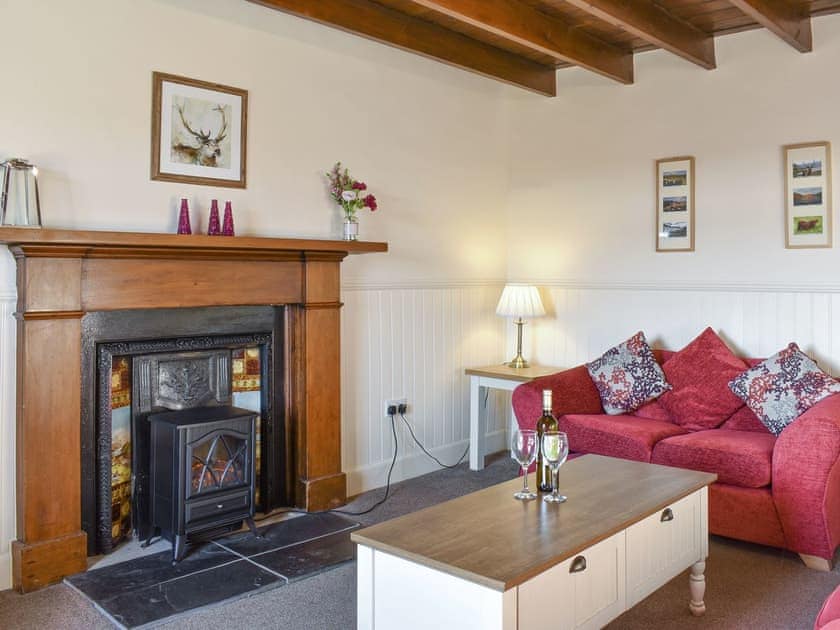 Welcoming living room | Mont Stewart Cottage, Whiting Bay, Isle of Arran