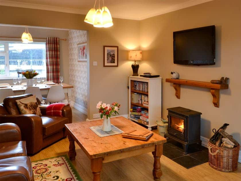 Cosy living area with wood burner | Westfield Farm Cottage, East Holywell, near Whitley Bay