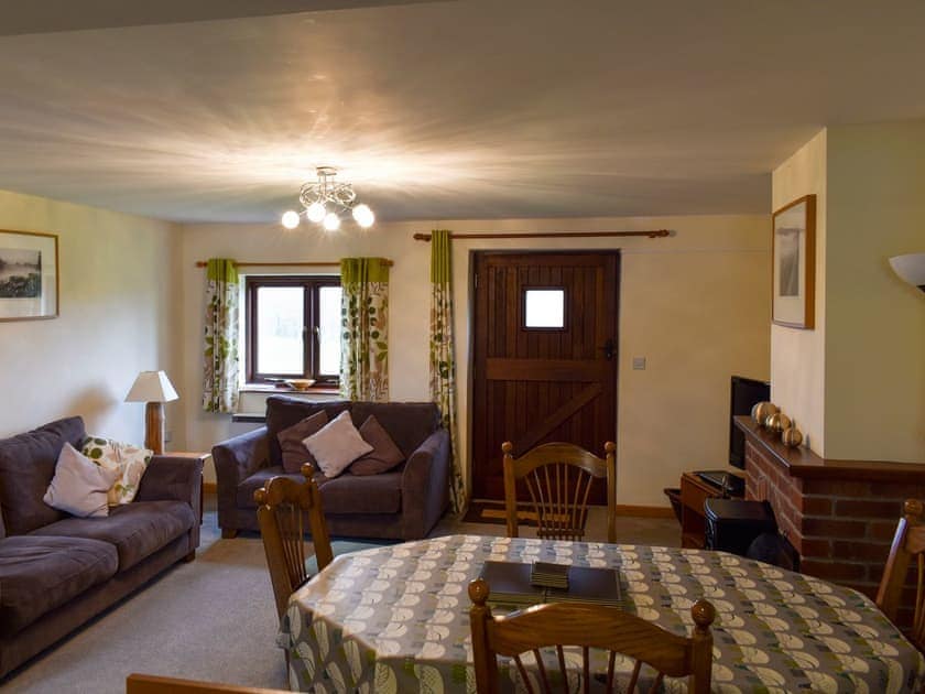 Spacious living and dining area | Trewin Court - Well Farm Holiday Cottages, Holsworthy, near Launceston