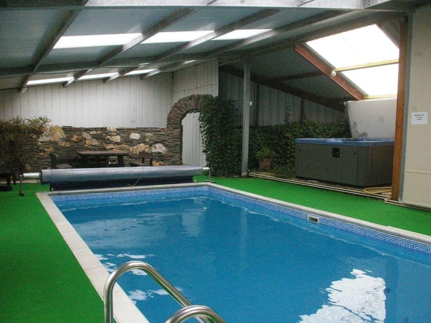 Shared swimming pool and hot tub | The Orchard, The Carthouse, The Farmhouse - Morlogws Farm Holiday Cottages, Capel Iwan, nea