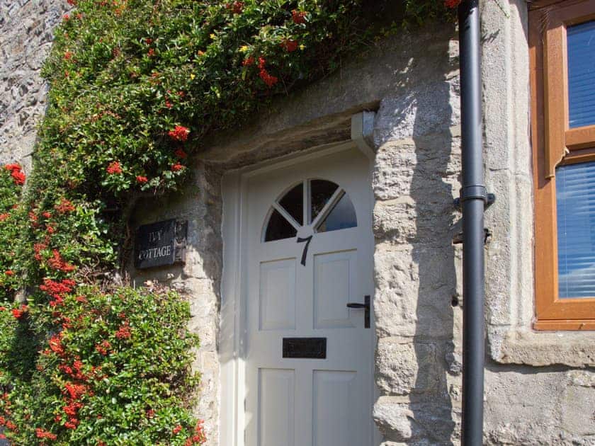 Delightful front aspect with well clipped bush | Ivy Cottage, Giggleswick near Settle