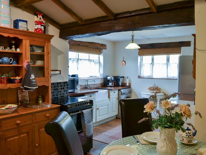 Beamed kitchen with breakfast area | Tattlepot Farmhouse, Pulham Market, near Diss