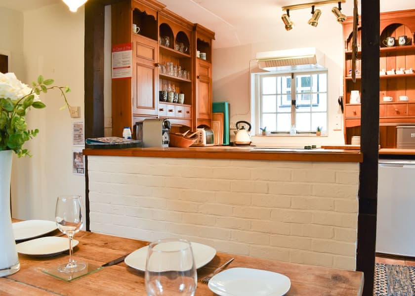 Lovely dining area overlooked by the kitchen | Yew Tree Cottage, Farnham, near Blandford Forum