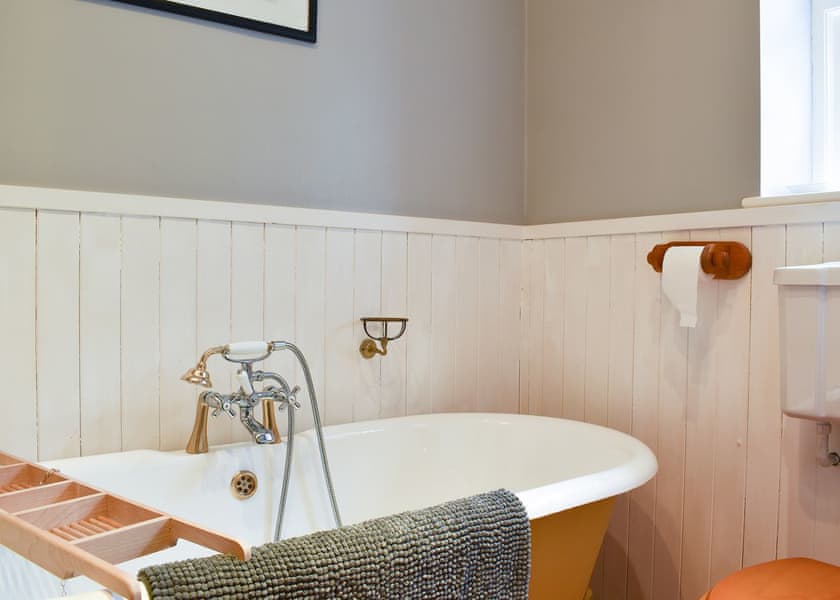 Bathroom with telephone style shower attachment | Yew Tree Cottage, Farnham, near Blandford Forum