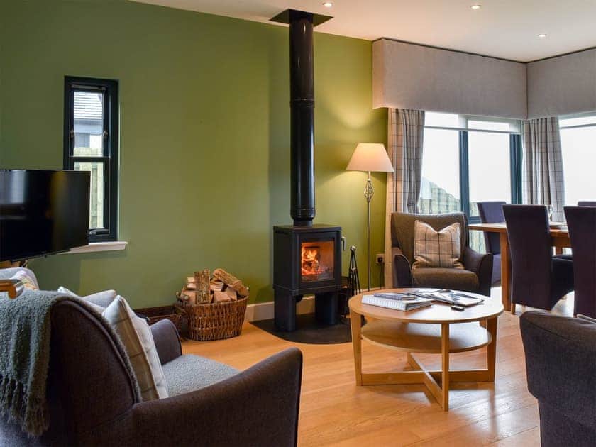 Cosy open plan living space with wood burner | Strathspey - Paddockhall Cottages, Linlithgow, near Edinburgh 