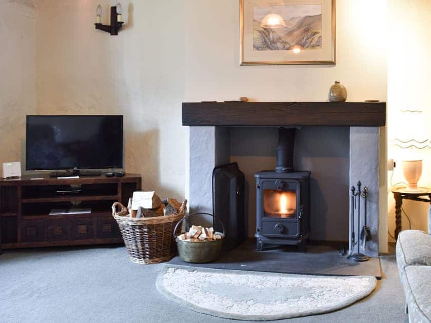 Living room with wood burner | Hydrangea Cottage, Witherslack, near Grange-over-Sands