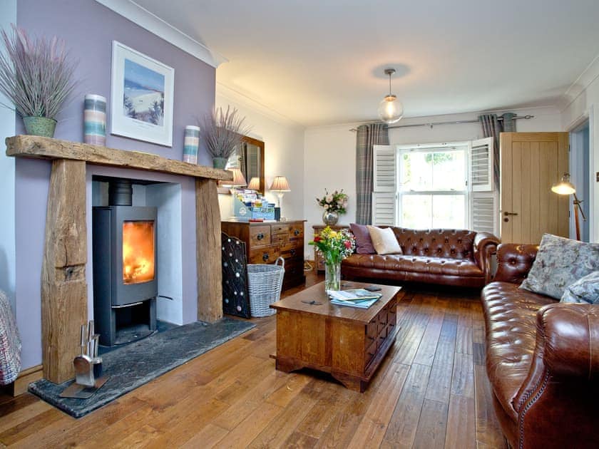 Welcoming living area with wood burner | Headland Views, Newquay