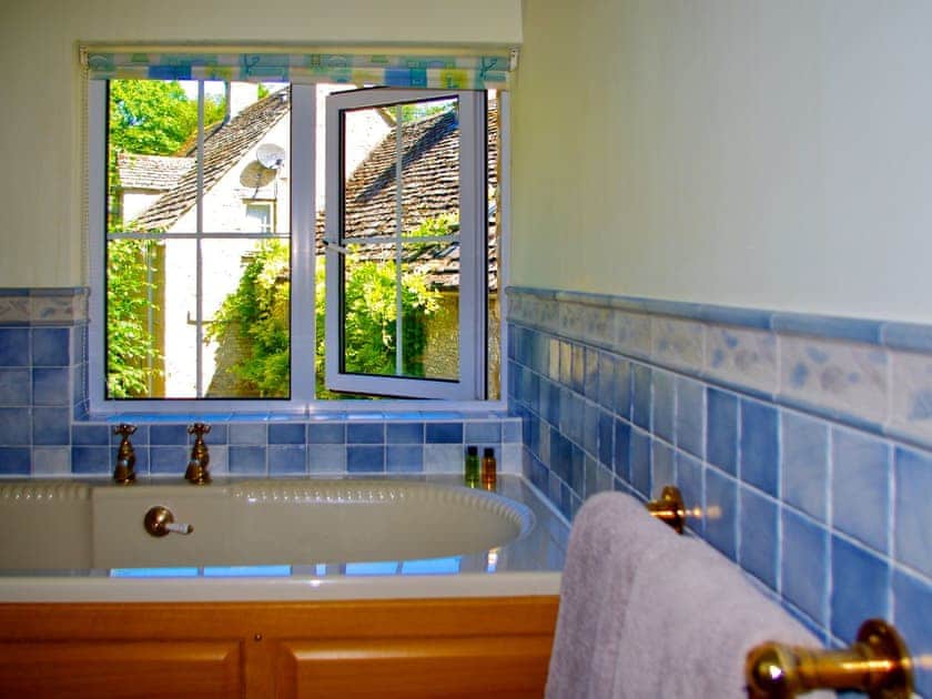 Bathroom with delightful garden views | Ivy Cottage, Chedworth, near Cheltenham