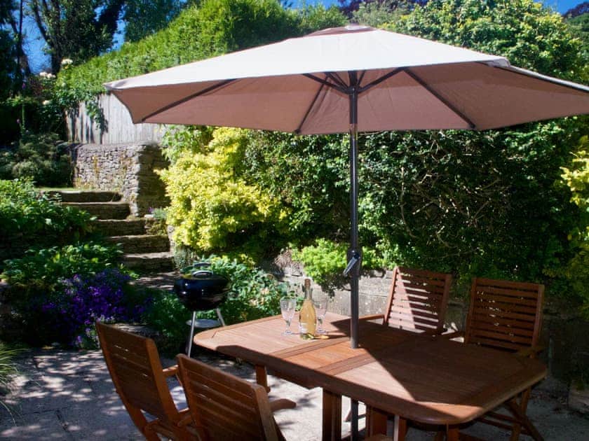 Delightfully shaded spot in the garden | Ivy Cottage, Chedworth, near Cheltenham
