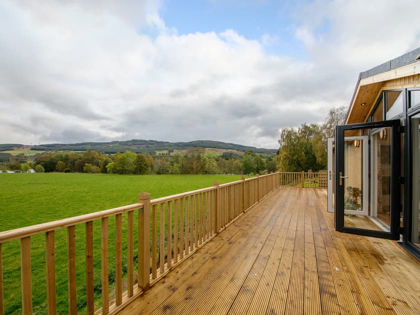 Outstanding holiday home with large decked terrace | Karelia Lodge, Keltyneyburn, near Aberfeldy