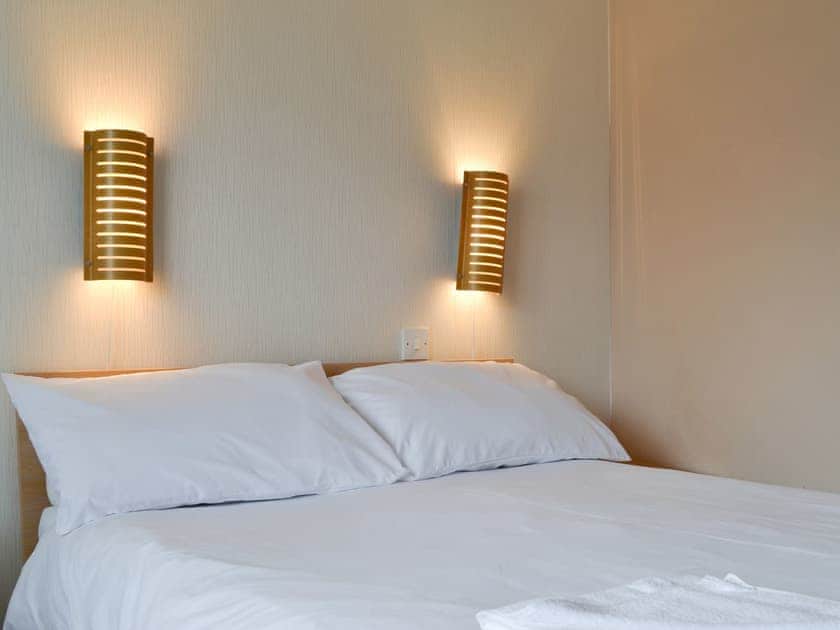 Relaxing en-suite double bedroom | Rowan Cottage, Aviemore