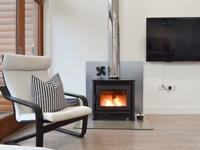 Living area with fantastic view and contemporary fireplace | Waterside Lodge Thirteen, Elland, near Brighouse 