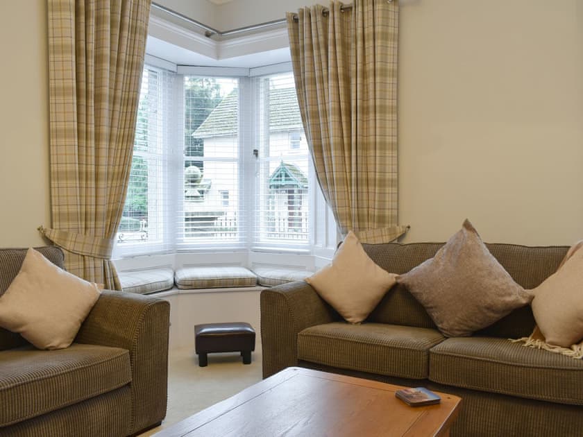 Comfortable seating within living area | West Lodge, Banchory
