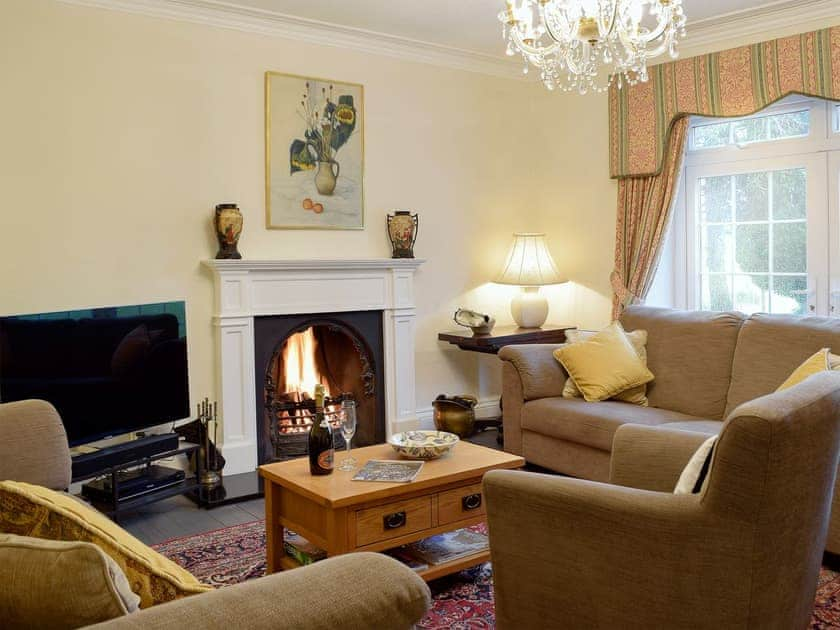 The impressive and spacious living room with large picture windows to take in the magnificent surroundings | Tan Y Castell, Llanmill, near Narberth