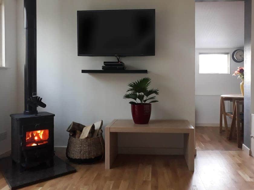 Light and airy living room with wood burner | Heron’s Rest Cottage - Milton, Drumnadrochit, near Inverness