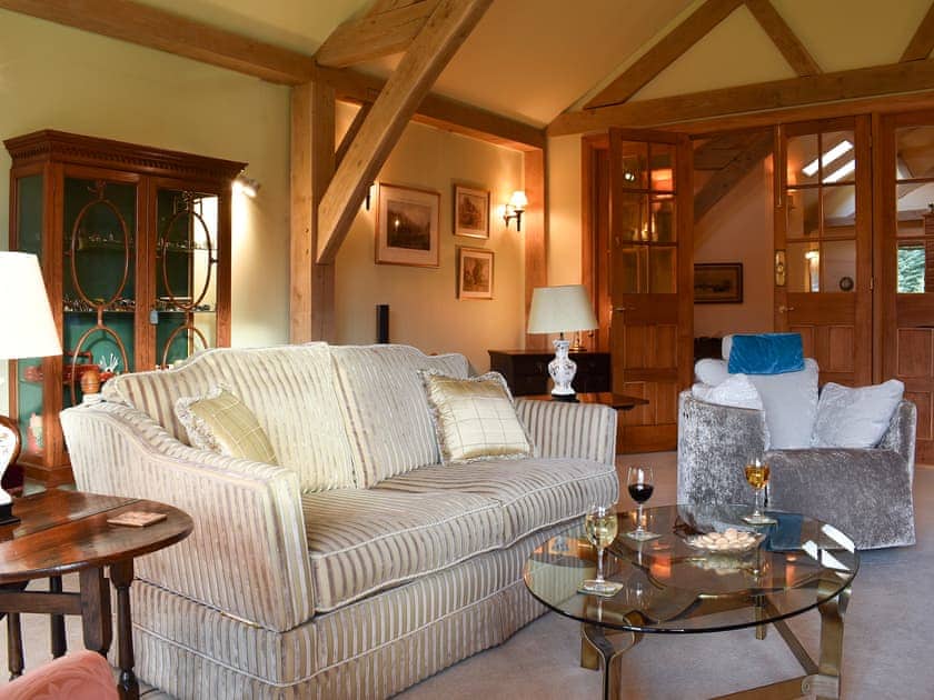Cosy living room with wood burner | Mill of Burncrook, Glenlivet, Ballindalloch, Moray 