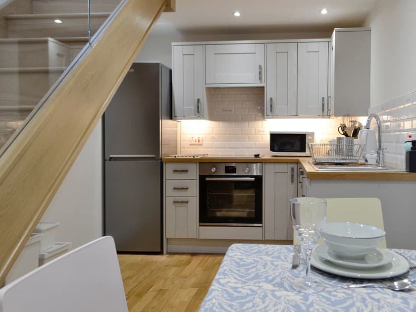 Fully equipped kitchen with dining area | Cornel Clyd (Cosy Corner), Felinfach, near Lampeter