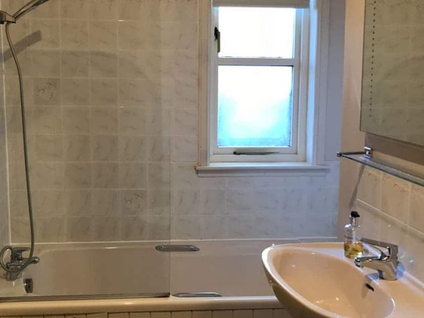 Family bathroom with shower over bath | Ferness - Tullochwood Lodges, Rafford, near Forres