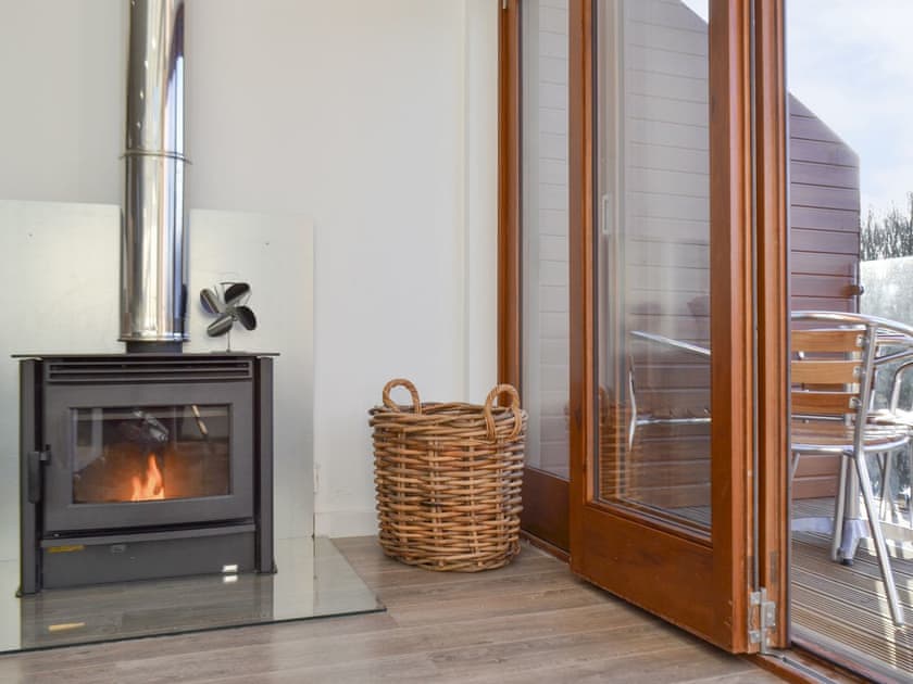 Warming wood burner | Waterside Lodge Sixteen - Ashgrove Country Park, Elland