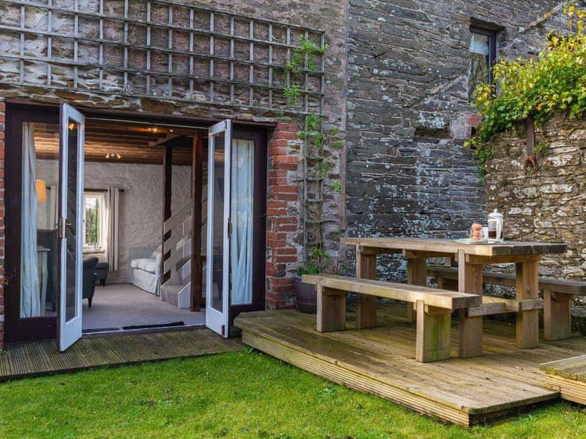 Decked patio with outdoor furniture | Dairy Cottage, Fowey