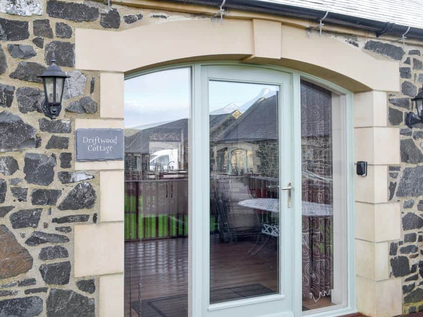 Main entrance to the holiday home | Driftwood Cottage, Newton-by-the-Sea, near Alnwick