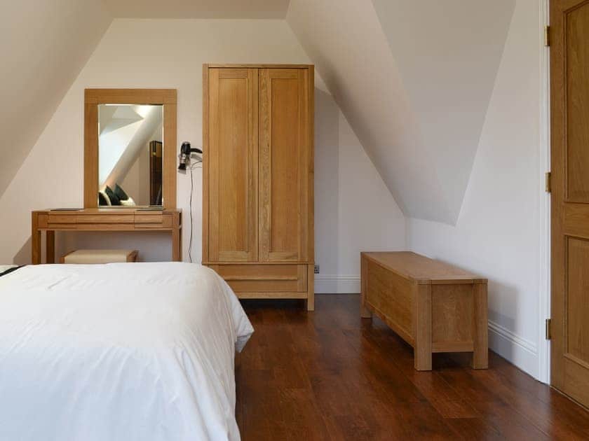 Spacious double bedroom with dressing area | The Pump House, Old Hunstanton, near Hunstanton