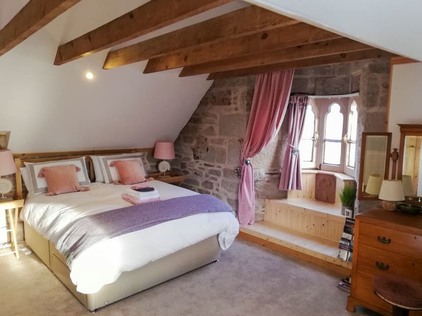 Relaxing bedroom with kingsize bed | St Brighs, Dingwall