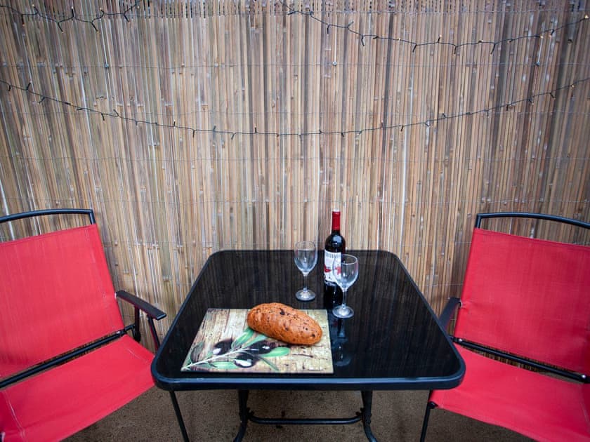 Enclosed yard with garden furniture | Freville Cottage, Shildon, near Bishop Auckland