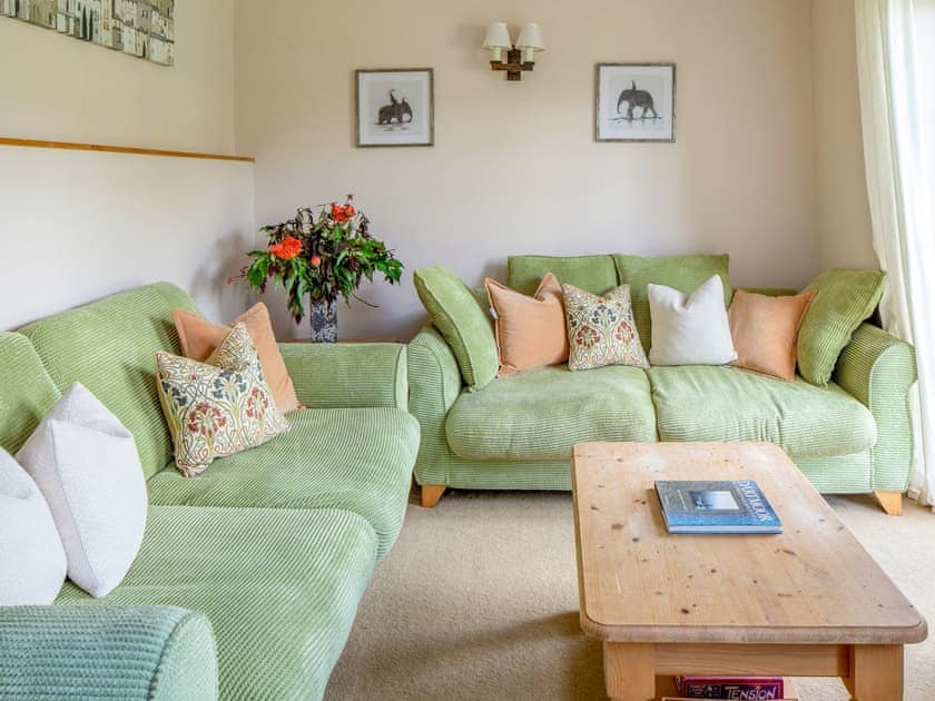 Comfortable living room | The Old Stable - Marshwood Manor Cottages, Bettiscombe, near Lyme Regis