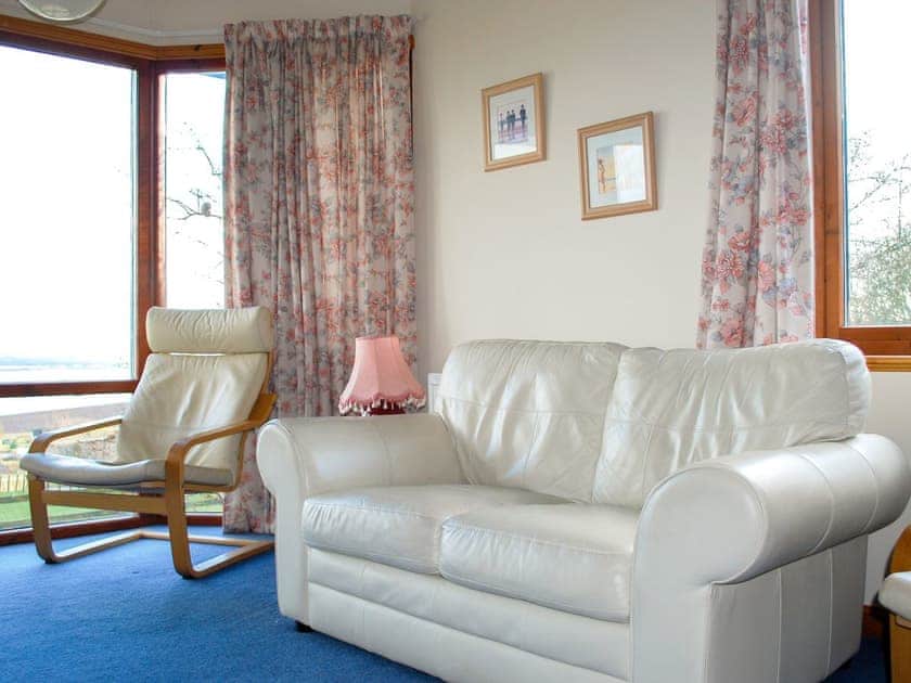 Comfy living room | Callachy Cottage - Flowerburn Holidays, Rosemarkie, near Fortrose
