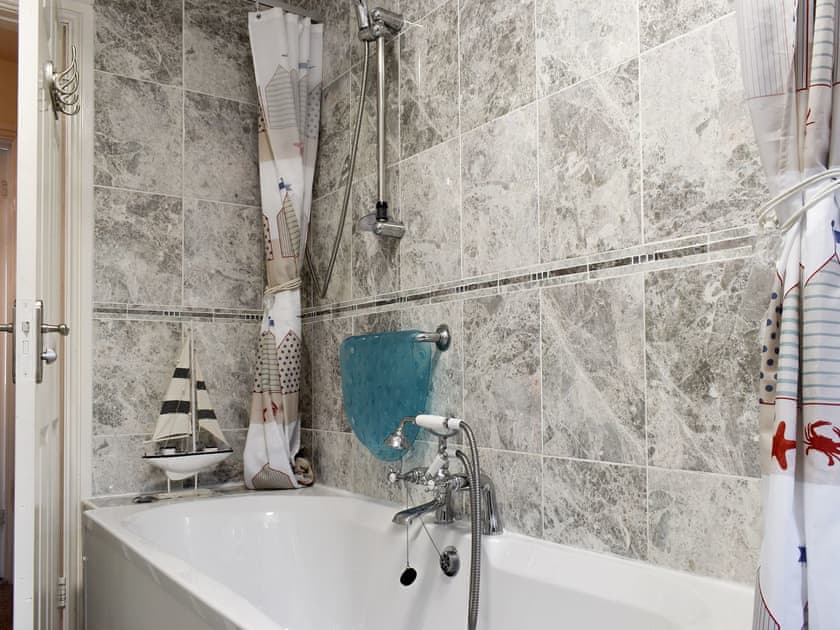 Family bathroom with shower over bath | Virginia Lodge, Watchet, near Minehead
