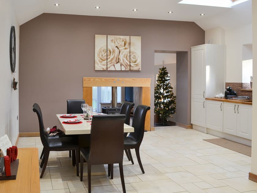 Dining and adjacent kitchen areas | Heckley Stable Cottage - Heckley Cottages, Alnwick