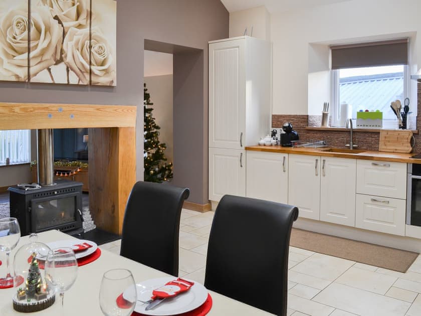 Elegant dining area and practically located kitchen | Heckley Stable Cottage - Heckley Cottages, Alnwick