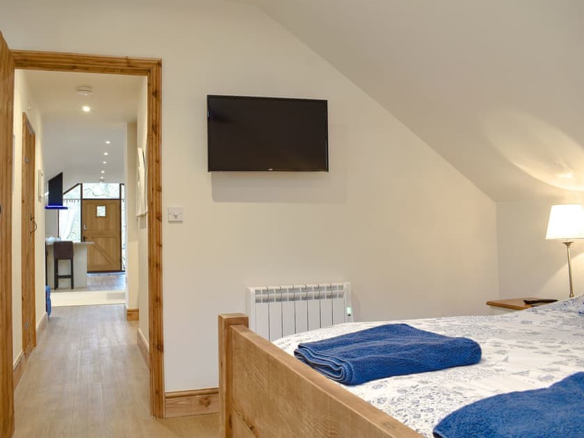 Comfortable double bedroom | Treeview Lodge, Uggeshall