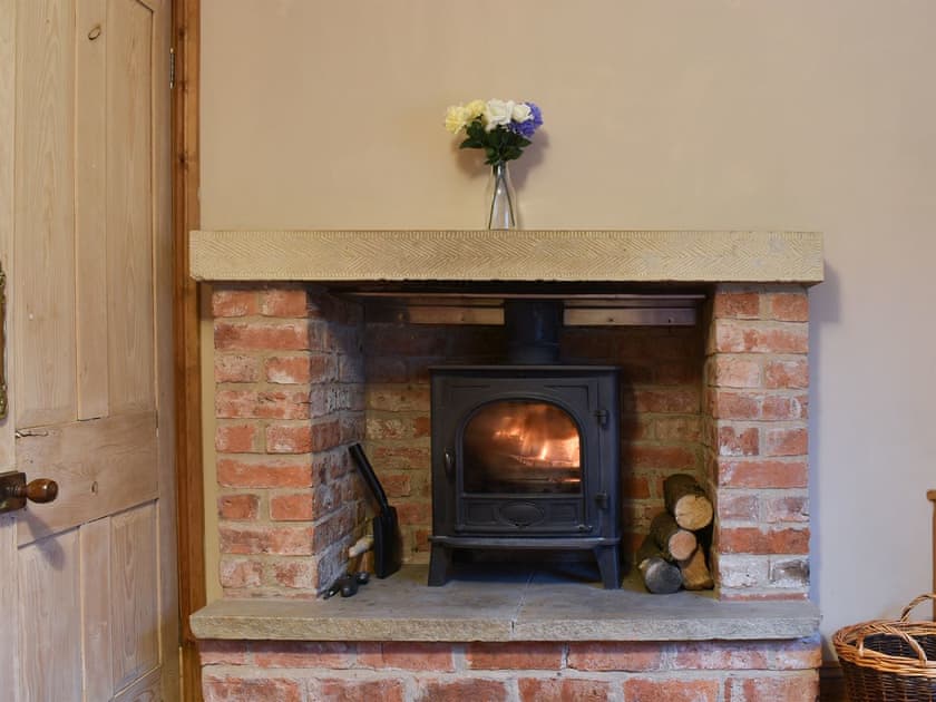 Dining room wood burner | Barnscliff Heights, Broxa, near Scarborough