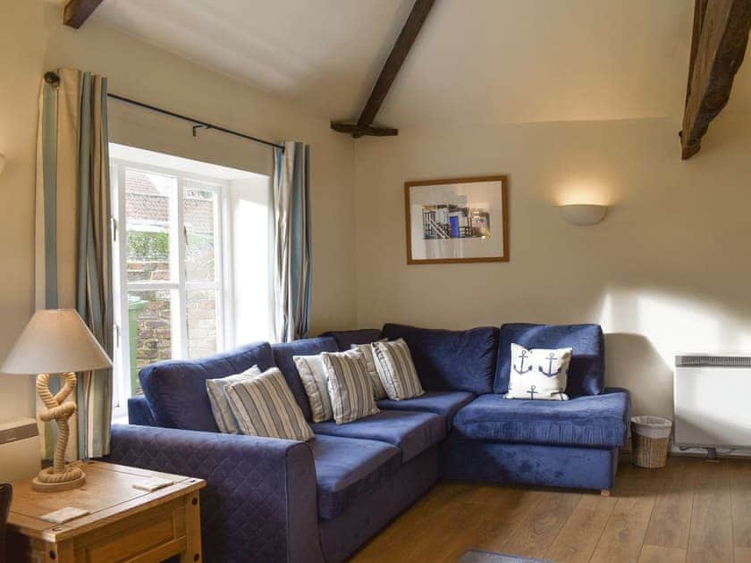Comfortable seating within living area | Manor Cottage, Stiffkey, near Wells-next-the-Sea
