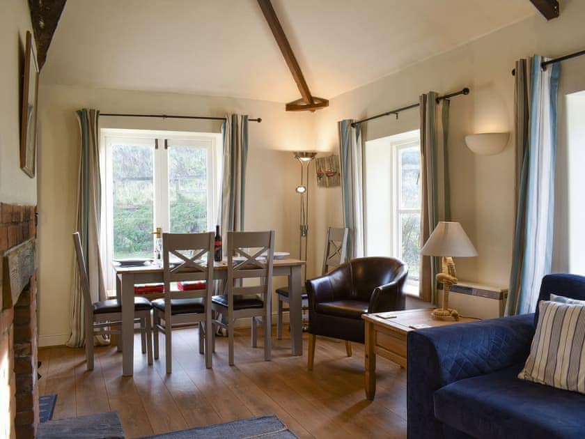 Characterful living and dining room | Manor Cottage, Stiffkey, near Wells-next-the-Sea