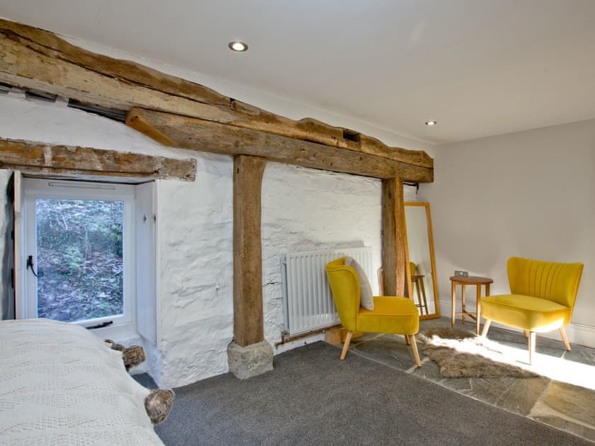 Good-sized double bedroom with seating area | The Old Mill, Egloskerry, near Launceston