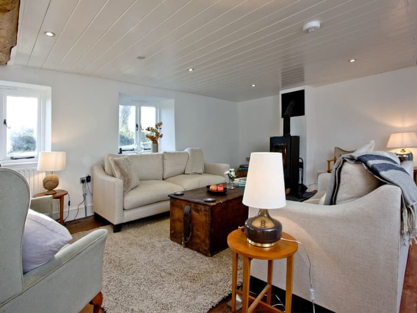 Spacious living area with wood burner | The Old Mill, Egloskerry, near Launceston