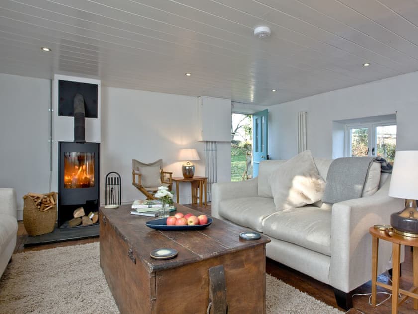 Welcoming living area with wood burner | The Old Mill, Egloskerry, near Launceston