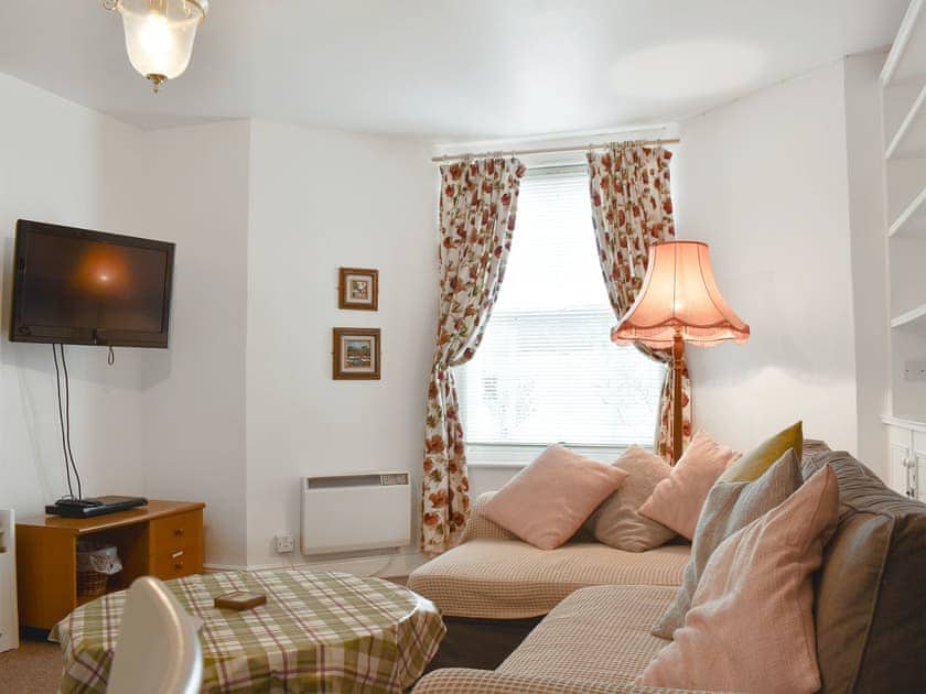 Comfortable living/ dining room | Flat 1 Garden View - Moray Apartments, Lowestoft
