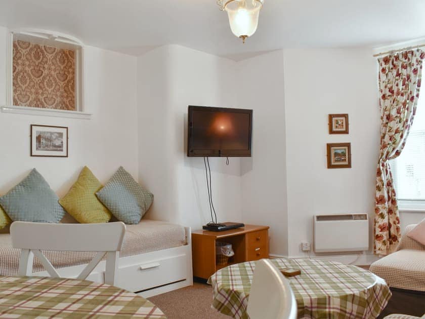 Comfortable living/ dining room | Flat 1 Garden View - Moray Apartments, Lowestoft