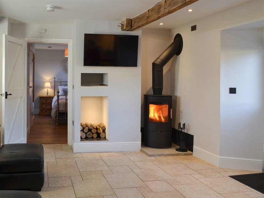 Living room with wood burner | Hetton Byre, near Chatton, Alnwick