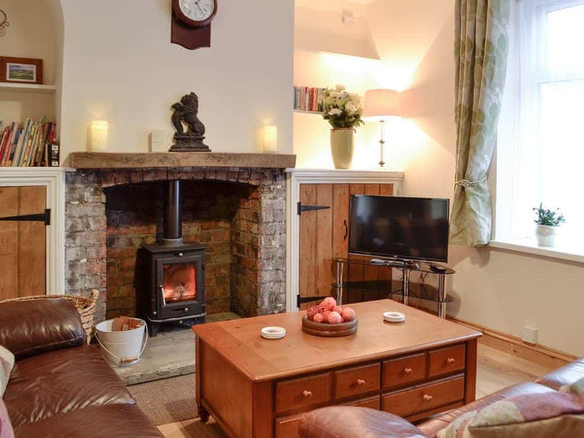 Welcoming living area with wood burner | Rhona’s Cottage, Abergavenny