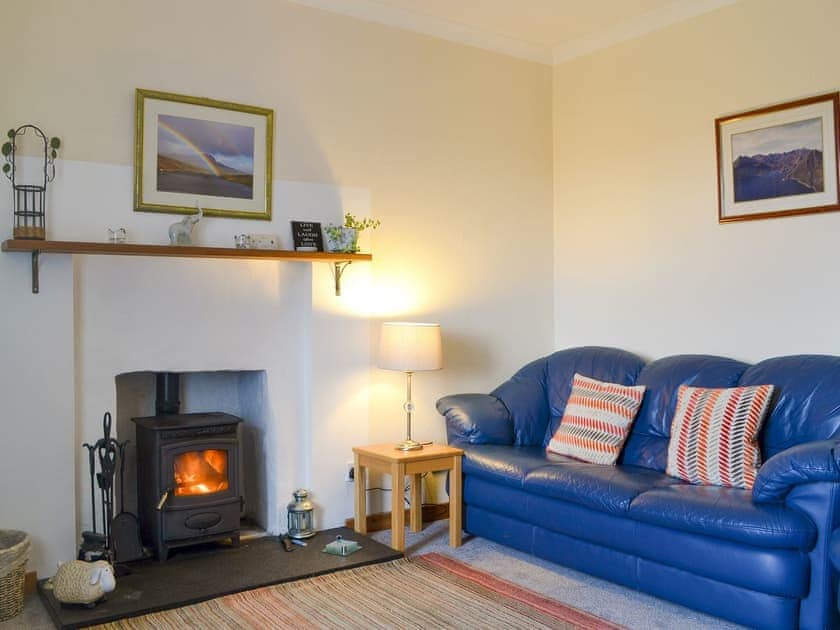 Comfy living room with a wood burner | Tote Cottage, Skeabost Bridge