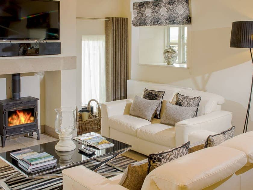 Comfortable living area with wood burner | Howgills Barn, Middleton, near Kirkby Lonsdale