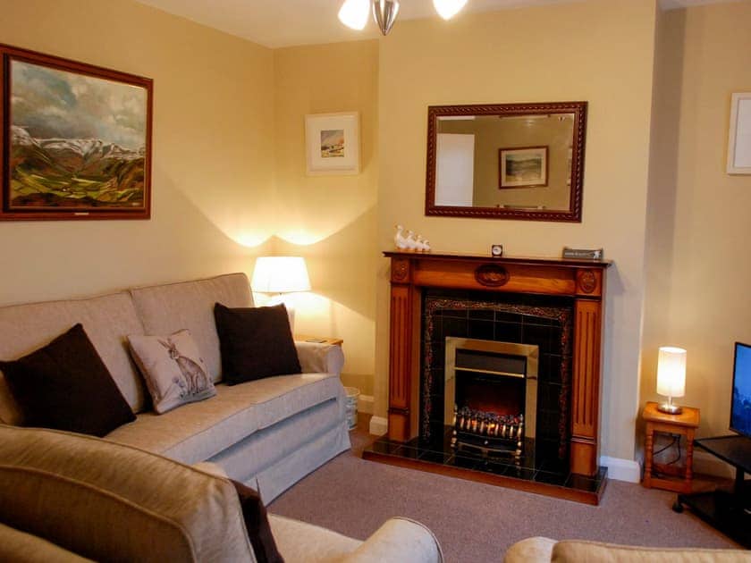 Feature fireplace in charming lounge | The Fells, Keswick