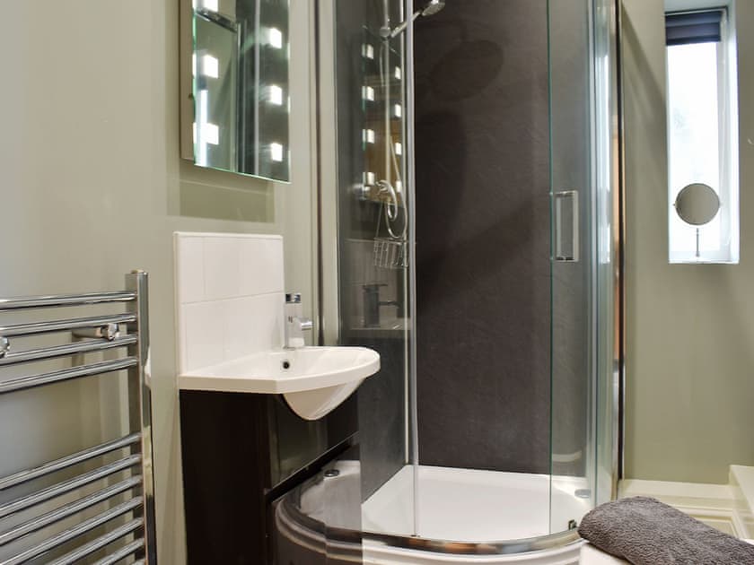 Shower room with shower cubicle, toilet and heated towel rail | Sycamore Cottage, Consett