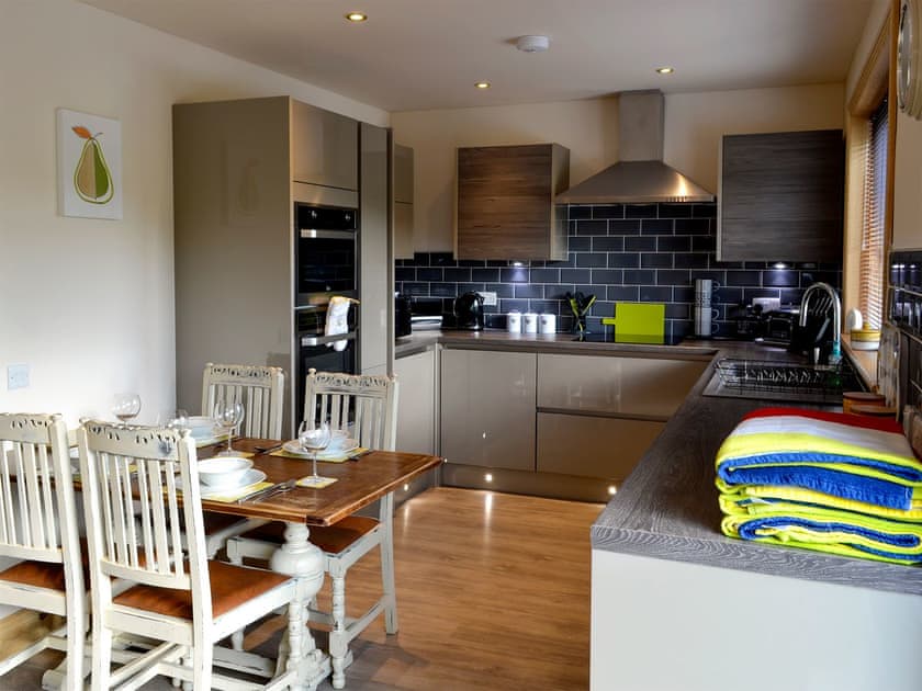 Kitchen and dining area | Woodview - Cairnyard Holiday Lodges, Lochanhead, Beeswing