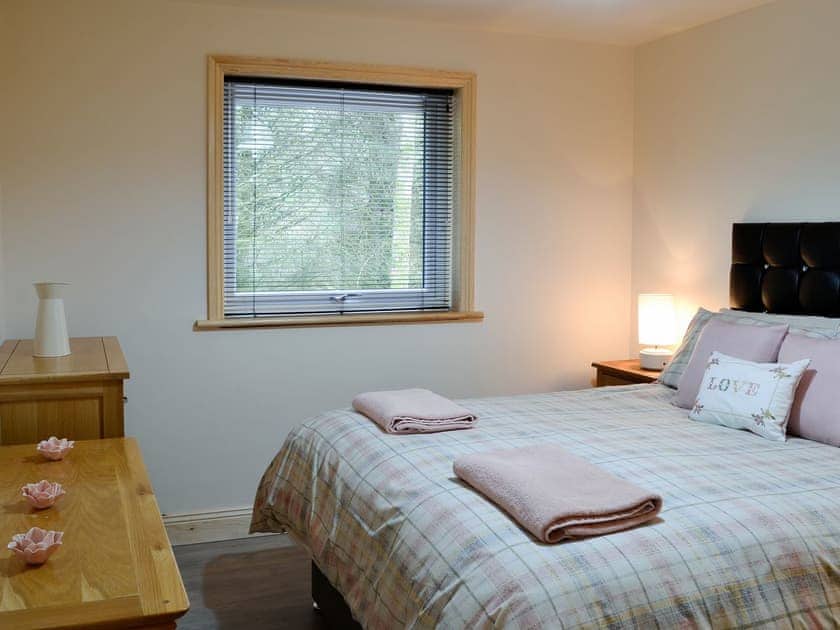 Welcoming double bedded room | Woodedge - Cairnyard Holiday Lodges, Lochanhead, Beeswing